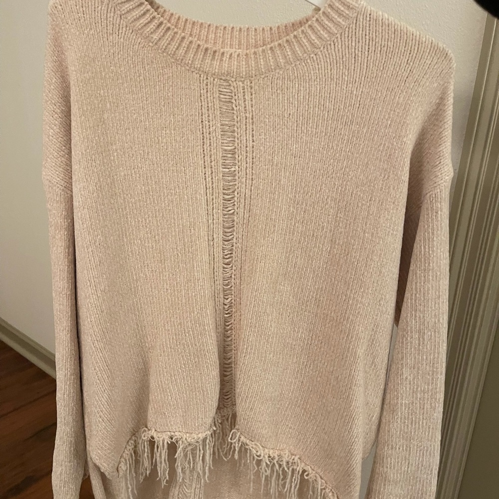 Cream sweater with fringe bottom